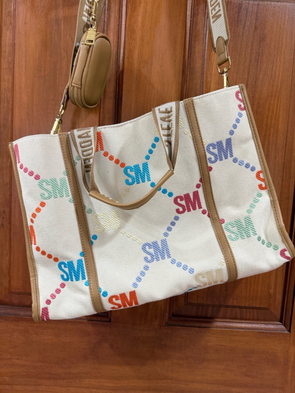 Steve Madden Cream Canvas Bag with Multicolor SM Logo and Tan Trim